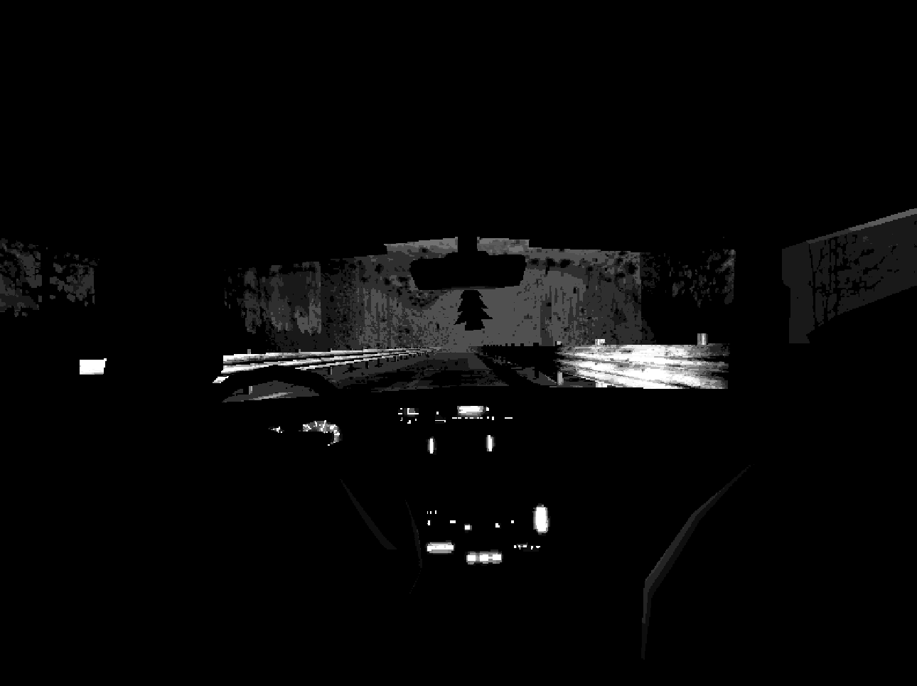 Screenshot of the player going for a drive, black and white view from inside the car